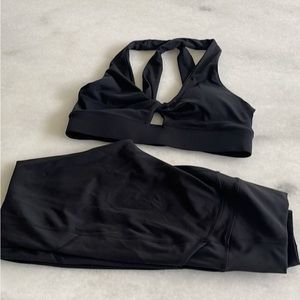 Fabletics black oasis twist sports bra size medium